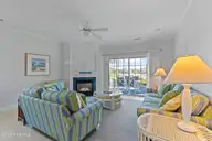 2555 St James Drive SE Unit 101, Southport, NC 28461 — 3-bedroom condo in St James, Southport, NC, photo 14 of 53: Living Room