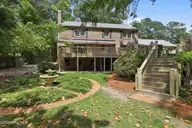 268 Shoreline Drive, New Bern, NC 28562 — 4-bedroom waterfront home in River Bend, New Bern, NC, photo 7 of 69: Lush backyard