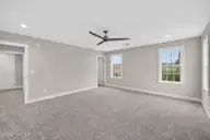 9575 Lily Pond Court NE, Leland, NC 28451 — 4-bedroom home in Lily Pond, Leland, NC, photo 21 of 37: Primary bedroom