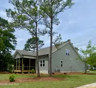 166 Deepwater Drive, Stella, NC 28582 — 3-bedroom waterfront home in River Oaks Plntn, Stella, NC, photo 2 of 38: *Similar Exterior