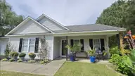 108 Willowbend Drive, Burgaw, NC 28425 — 3-bedroom home in Tealbriar, Burgaw, NC, photo 2 of 27: Covered front porch