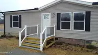 7584 Alice Court, Castalia, NC 27816 — 3-bedroom manufactured home in Culpepper Landing, Castalia, NC, photo 3 of 45: DJI_0887