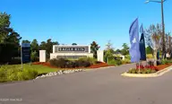 333 Eagle Claw Drive 4037, Carolina Shores, NC 28467 — 3-bedroom home in Eagle Run, Carolina Shores, NC, photo 13 of 23: Front Entrance of Eagle Run