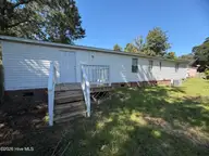 335 Cottonwood Lane, Castle Hayne, NC 28429 — 3-bedroom manufactured home in Rock Hill Plantation, Castle Hayne, NC, photo 16 of 21: IMG_5173