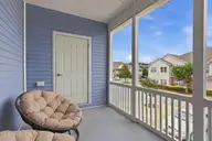1924 Tara Court 202, Greenville, NC 27858 — 2-bedroom condo in Tara, Greenville, NC, photo 11 of 39: Screen porch 1