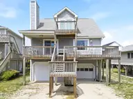 1105 S Shore Drive, Surf City, NC 28445 — 3-bedroom waterfront home in Horse Hammock Beach, Surf City, NC, photo 1 of 63: 1_dji_0991