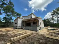 860 Central Drive, Southern Pines, NC 28387 — 4-bedroom home in Pine Needles, Southern Pines, NC, photo 18 of 22: Rear
