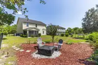 3008 Arundel Hill SW, Shallotte, NC 28470 — 4-bedroom home in Rutledge, Shallotte, NC, photo 5 of 45: Half acre lot & firepit