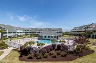 9201 Coast Guard Road F102, Emerald Isle, NC 28594 — 1-bedroom condo in Pebble Beach, Emerald Isle, NC, photo 1 of 33: Pebble Beach F204 020