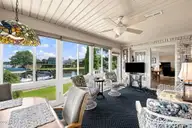 906 Jewell Court, New Bern, NC 28560 — 4-bedroom waterfront home in Fairfield Harbour, New Bern, NC, photo 11 of 52: Sunroom