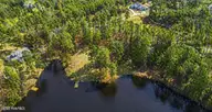 305 Lakewood Drive, Aberdeen, NC 28315 — waterfront lot in Lake Diamond, Aberdeen, NC, photo 2 of 12: IMG_8648