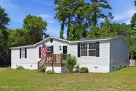 122 Lejeune Road, Cape Carteret, NC 28584 — 3-bedroom home in Bayshore Park, Cape Carteret, NC, photo 3 of 43: Front 3