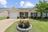 1067 Tideline Drive, Leland, NC 28451 — 3-bedroom townhome in Westgate Shoreline, Leland, NC, photo 1 of 56: front