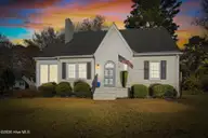 208 Clyde Avenue NW, Wilson, NC 27893 — 3-bedroom home in Cavalier Terrace, Wilson, NC, photo 2 of 29: Front Exterior Twilight