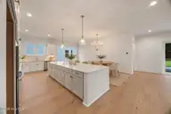 1217 Rockhill Road, Castle Hayne, NC 28429 — 3-bedroom waterfront home in Sunset Reach, Castle Hayne, NC, photo 5 of 75: SR42R Kitchenn to Dining area