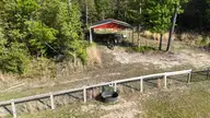 104 Bridle Path Lane, Carthage, NC 28327 — 3-bedroom waterfront home in Carolina Equest, Carthage, NC, photo 23 of 64: Tractor Cover
