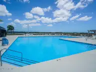 465 Lockwood Lane SW, Supply, NC 28462 — 3-bedroom waterfront home in Lockwood Folly, Supply, NC, photo 23 of 32: Pool
