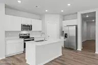 202 Hamlet Court, Richlands, NC 28574 — 4-bedroom home in Squires Run Village, Richlands, NC, photo 13 of 58: Kitchen