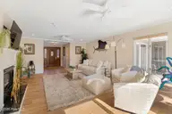 106 Cherry Court, Pine Knoll Shores, NC 28512 — 3-bedroom waterfront home in Pine Knoll Association, Pine Knoll Shores, NC, photo 14 of 63: Living Room