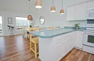 101 Shipwreck Lane E, Emerald Isle, NC 28594 — 3-bedroom waterfront townhome in Spinnakers Reach, Emerald Isle, NC, photo 13 of 38: Kitchen