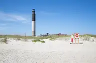2084 Cypress Hill Drive SE Lot 273, Bolivia, NC 28422 — 3-bedroom home in Rolling Hills, Bolivia, NC, photo 21 of 26: Oak Island lighthouse beach 4.2022L33A24