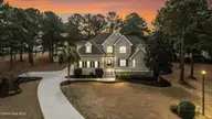 106 Blue Heron Circle, Sneads Ferry, NC 28460 — 4-bedroom home in Creeks Edge, Sneads Ferry, NC, photo 2 of 69: 1_DJI_20260130111105_0813_D