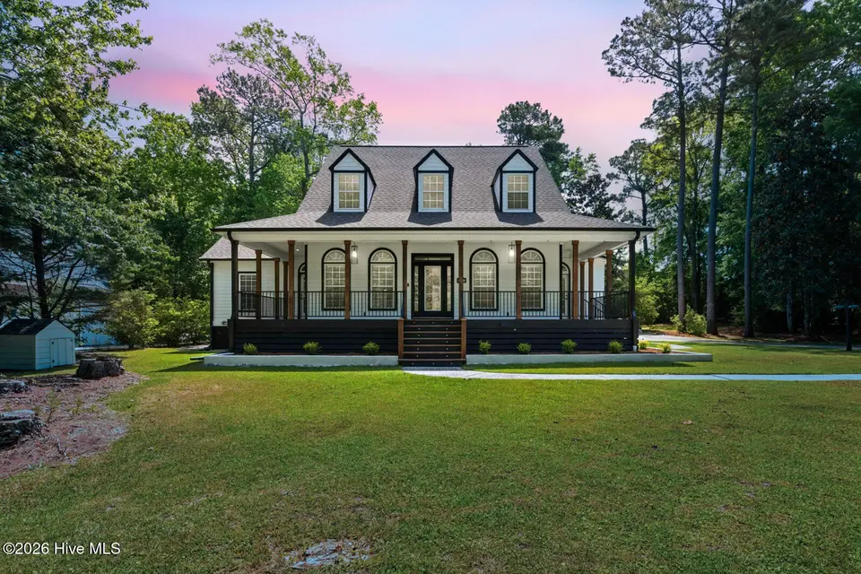 108 Canvasback Point, Hampstead, NC 28443 — 4-bedroom home in Pelican Reef, Hampstead, NC, photo 1 of 55: thetwilight-1