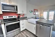 16 E First Street # 109, Ocean Isle Beach, NC 28469 — 1-bedroom waterfront condo in Ocean Cove, Ocean Isle Beach, NC, photo 11 of 24: Kitchen3