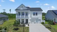 8850 Baton Rouge Avenue NW, Calabash, NC 28467 — 5-bedroom home in Brunswick Plantation, Calabash, NC, photo 1 of 58: Front