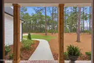 160 Midland Trail, Pinehurst, NC 28374 — 4-bedroom home in Midland Estate, Pinehurst, NC, photo 12 of 61: Peaceful Front Porch Views