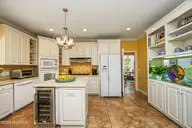 150 Quail Hollow Drive, Pinehurst, NC 28374 — 3-bedroom waterfront home in CCNC, Pinehurst, NC, photo 21 of 53: 27Kitchen