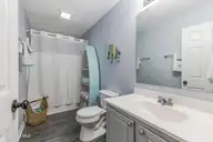 1803 W Yacht Drive, Oak Island, NC 28465 — 3-bedroom home in Pinners Point, Oak Island, NC, photo 18 of 39: Guest Bathroom