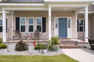 705 Plowshare Court, Maysville, NC 28555 — 3-bedroom home in Batchelors Cove, Maysville, NC, photo 2 of 36: Front Porch Entry
