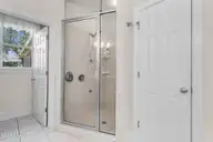 1310 Grandiflora Drive, Leland, NC 28451 — 4-bedroom home in Magnolia Greens, Leland, NC, photo 22 of 56: Primary Bathroom