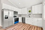 165 Long Pond Loop, Swansboro, NC 28584 — 2-bedroom waterfront condo in Cabins at Old Horse, Swansboro, NC, photo 6 of 25: Kitchen