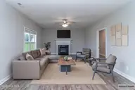 313 Aaron'S Place, Goldsboro, NC 27530 — 4-bedroom home in Aaron's Place, Goldsboro, NC, photo 11 of 34: staged-familyroom