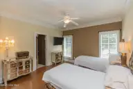 68 Abbottsford Drive, Pinehurst, NC 28374 — 4-bedroom home in Pinewild CC, Pinehurst, NC, photo 23 of 53: main level xbed1-1