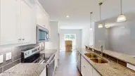219 Willowbrook Drive, Pikeville, NC 27863 — 3-bedroom home in Willowbrook, Pikeville, NC, photo 9 of 27: Kitchen