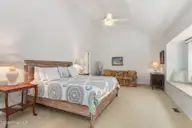 579 Coral Ridge Road, Pine Knoll Shores, NC 28512 — 4-bedroom waterfront home in Beacon's Reach, Pine Knoll Shores, NC, photo 20 of 62: Spacious Primary Bedroom