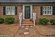 3012 Coleberry Trail, Rocky Mount, NC 27804 — 4-bedroom home in Lamplighter Square, Rocky Mount, NC, photo 2 of 26: Classic brick with timeless appeal