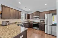 1232 South Brook Road, Winnabow, NC 28479 — 4-bedroom home in Mallory Creek Plantation, Winnabow, NC, photo 15 of 48: 15_kitchen