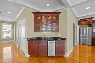 185 Seawatch Way, Kure Beach, NC 28449 — 5-bedroom waterfront home in Seawatch, Kure Beach, NC, photo 15 of 72: 28_wet bar
