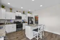 646 Indigo Johnston Drive, Jacksonville, NC 28546 — 5-bedroom home in Onslow Bay, Jacksonville, NC, photo 14 of 54: 16_kitchen