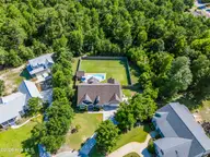 207 Ottaway Court, Hampstead, NC 28443 — 4-bedroom waterfront home in Bent Tree, Hampstead, NC, photo 2 of 69