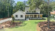 5748 Oak Bluff Lane, Wilmington, NC 28409 — 4-bedroom home in Raintree, Wilmington, NC, photo 1 of 52