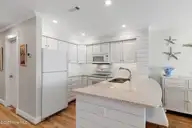 1010 Salter Path Road 6, Indian Beach, NC 28512 — 2-bedroom waterfront condo in Mariners Point, Indian Beach, NC, photo 8 of 39: Kitchen with island