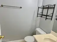 113 Gladiola Drive, New Bern, NC 28562 — 3-bedroom home in Surrey Downs, New Bern, NC, photo 10 of 12: Full bath in hallway
