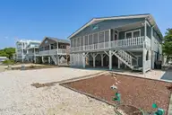 411 34th Street, Sunset Beach, NC 28468 — 5-bedroom home, Sunset Beach, NC, photo 2 of 45: 411 34th Street, Sunset Beach