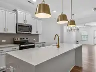 38 N District Avenue, Clayton, NC 27527 — 3-bedroom home in Flowers Plantation, Clayton, NC, photo 6 of 38: 007-1280x960-kitchen