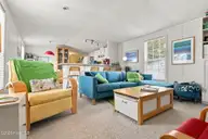 1530 Salter Path Road 15, Indian Beach, NC 28512 — 2-bedroom waterfront manufactured home in Tradewinds, Indian Beach, NC, photo 15 of 32: Living Room